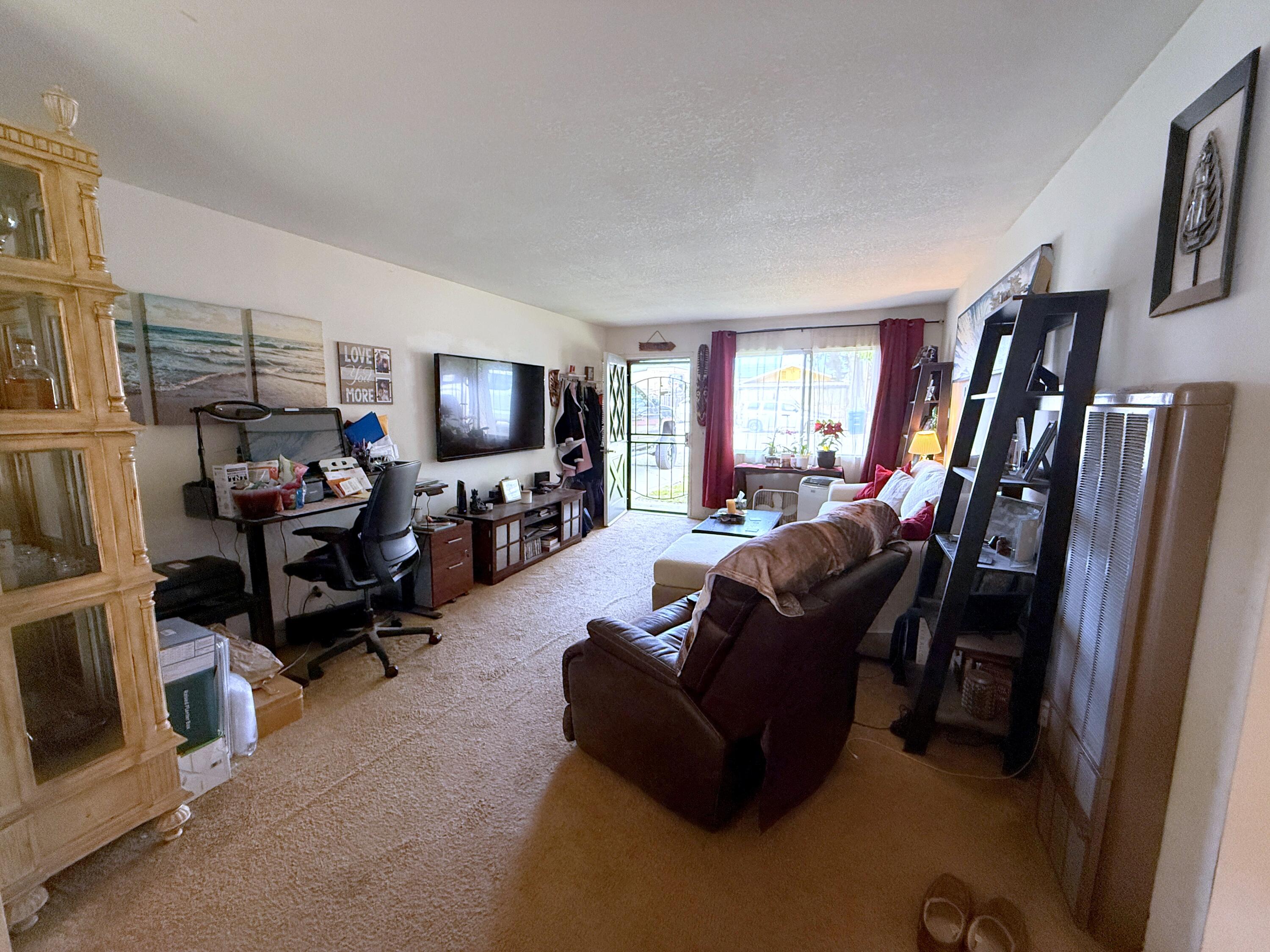 50 East Portal Street Oak View, CA 93022 - Photo 21 of 33 a living room with furniture and a flat screen tv