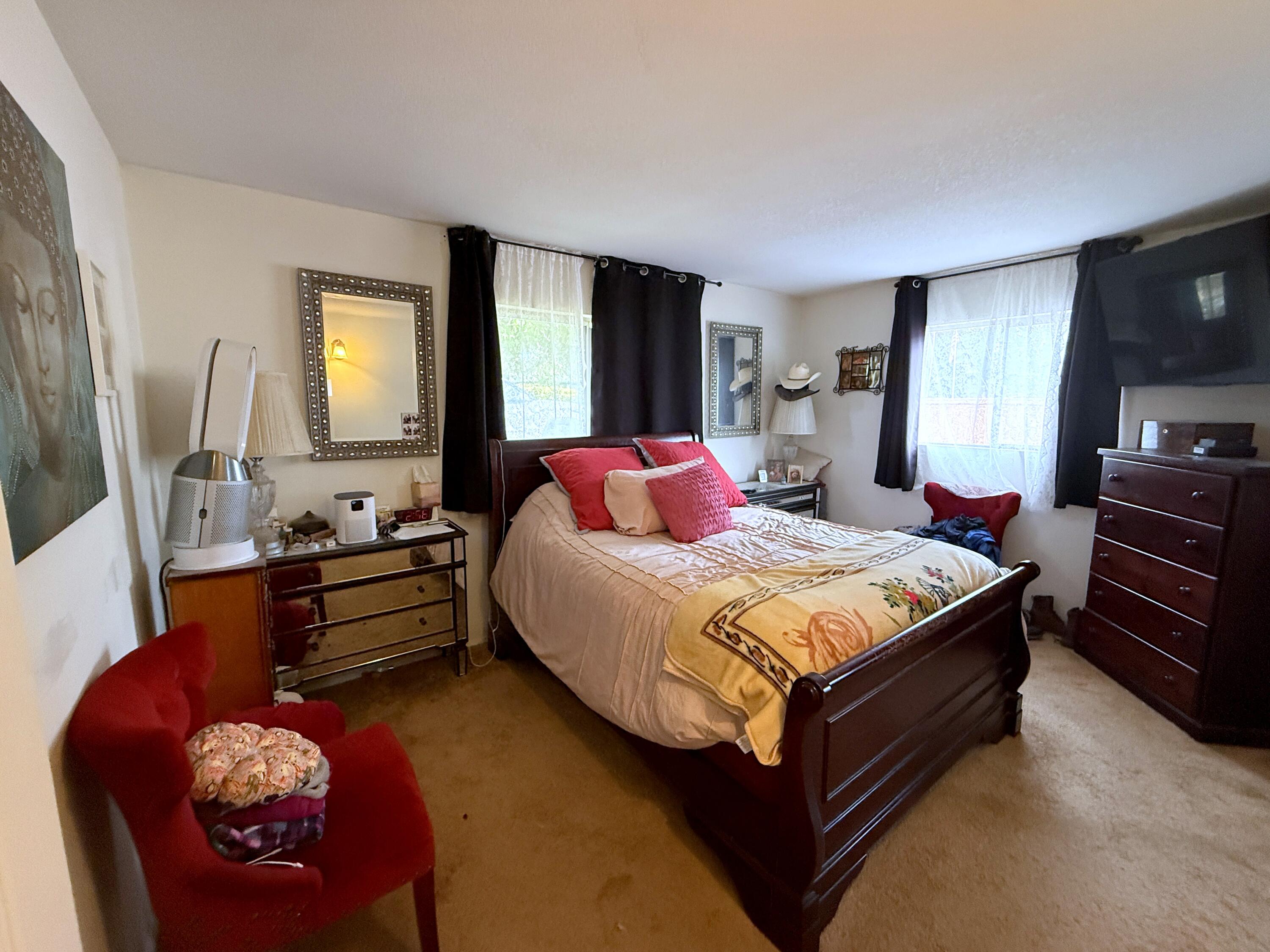 50 East Portal Street Oak View, CA 93022 - Photo 27 of 33 a bedroom with a bed dresser and a window
