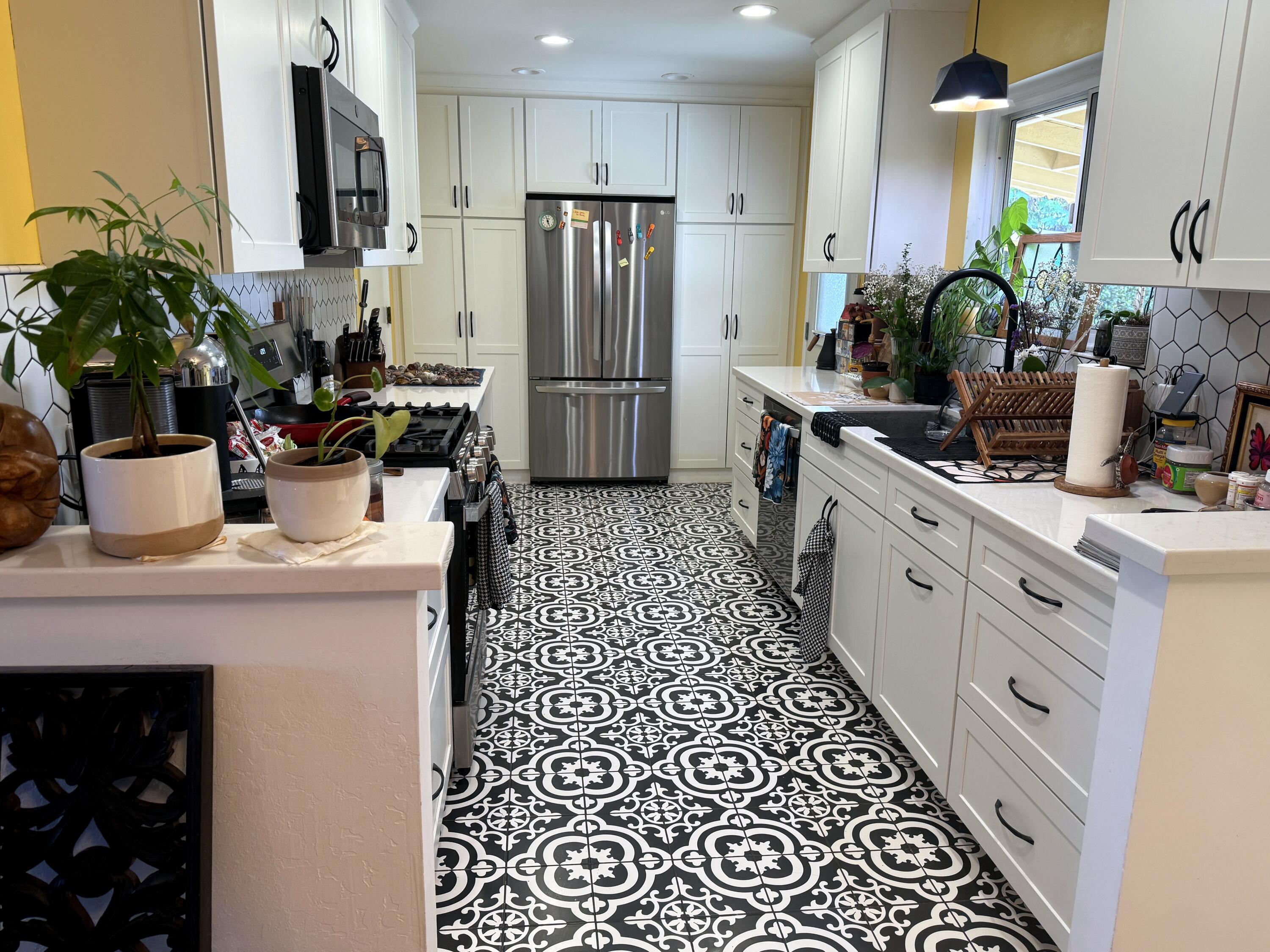 50 East Portal Street Oak View, CA 93022 - Photo 6 of 33 a kitchen with a sink appliances and cabinets