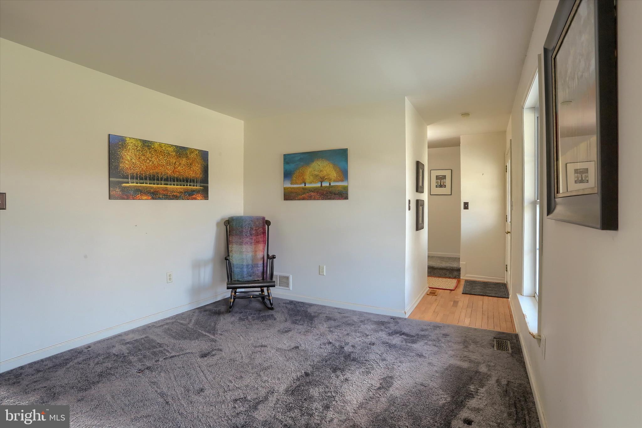 440 Whisler Road Etters, PA 17319 - Photo 14 of 33 a view of a hallway with paintings on the wall