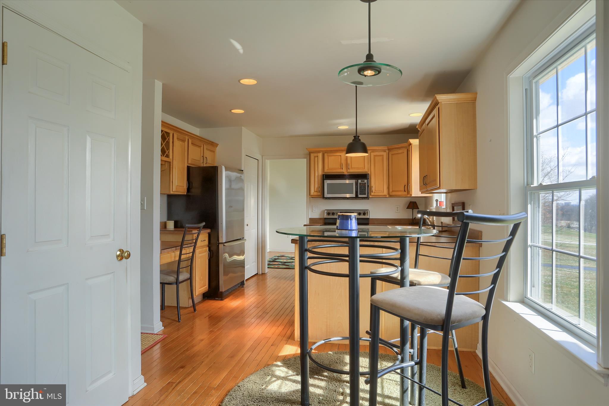 440 Whisler Road Etters, PA 17319 - Photo 8 of 33 a view of a dining room with furniture window and wooden floor