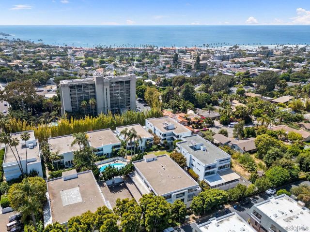 an aerial view of a house with a outdoor space