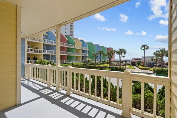 a view of a balcony with door