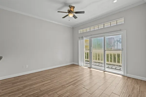 a view of an empty room with a window