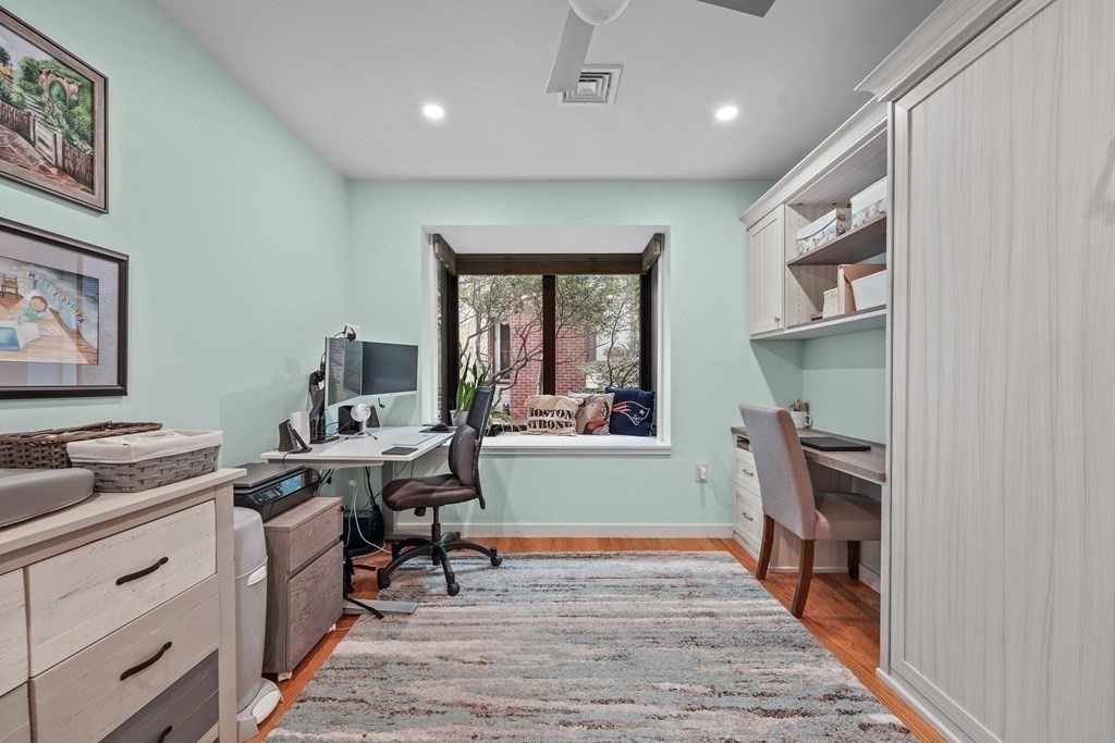 6 Shipway Place, Unit 6 Boston, MA 02129 - Photo 14 of 25 a view of a workspace with furniture and a window