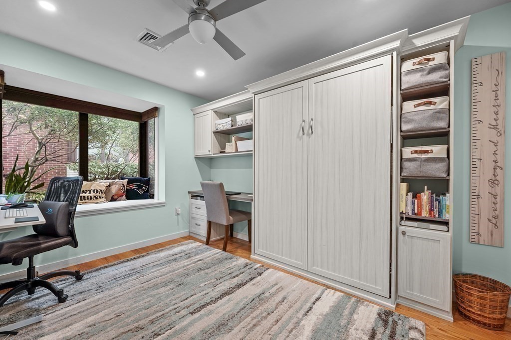 6 Shipway Place, Unit 6 Boston, MA 02129 - Photo 15 of 25 a view of a workspace with furniture and a window