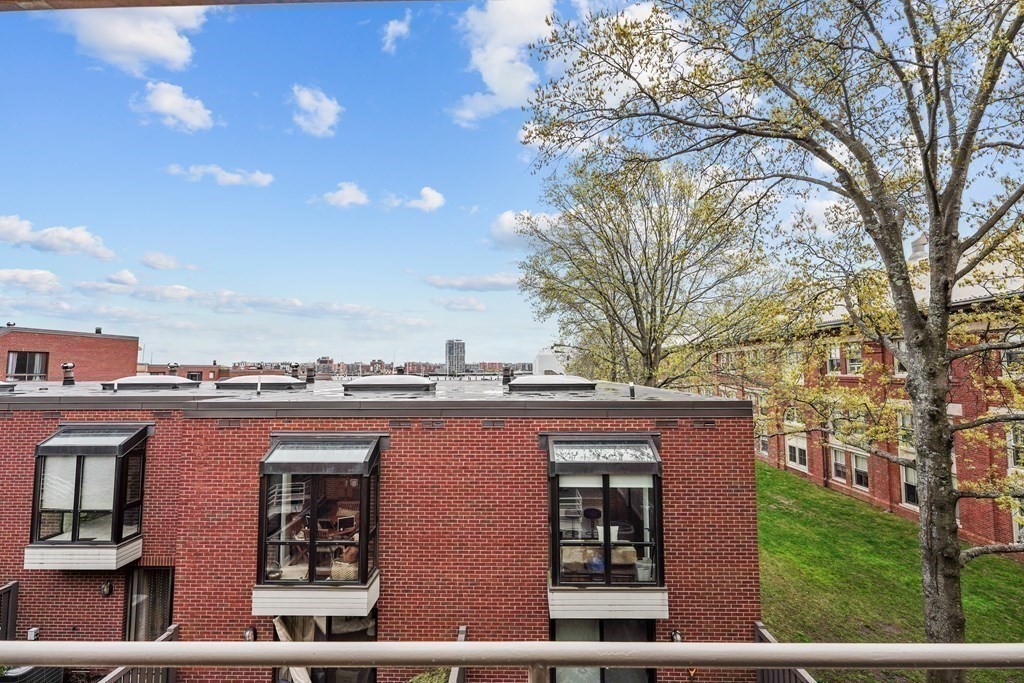 6 Shipway Place, Unit 6 Boston, MA 02129 - Photo 18 of 25 a view of a house with a yard