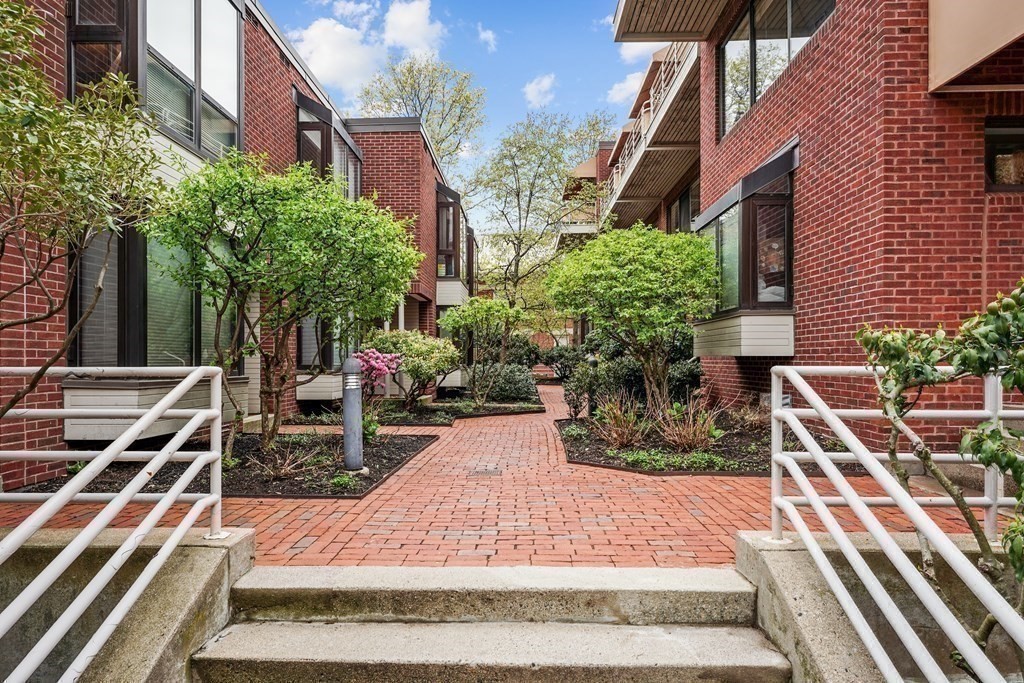 6 Shipway Place, Unit 6 Boston, MA 02129 - Photo 23 of 25 a backyard of a house with outdoor seating