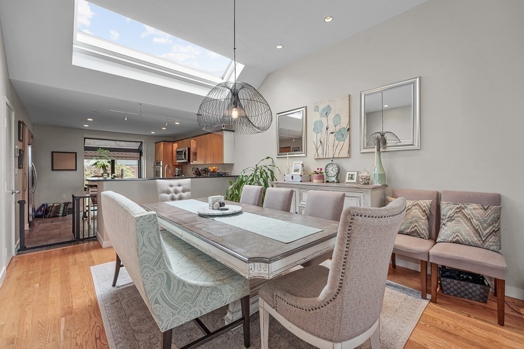 6 Shipway Place, Unit 6 Boston, MA 02129 - Photo 5 of 25 a dining room with furniture and wooden floor
