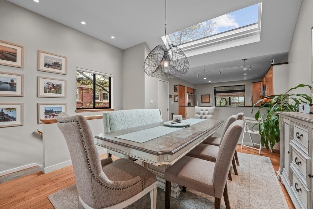 6 Shipway Place, Unit 6 Boston, MA 02129 - Photo 6 of 25 a view of a dining room with furniture window and wooden floor