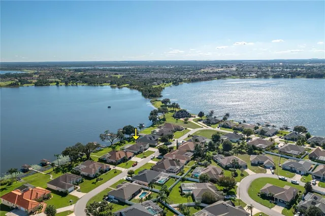 an aerial view of multiple house with outdoor space