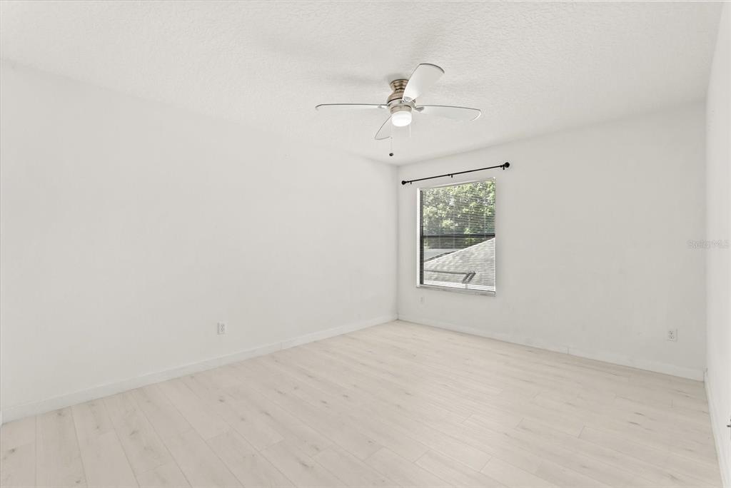 871 Blairmont Lane Lake Mary, FL 32746 - Photo 31 of 56 a view of an empty room with a window