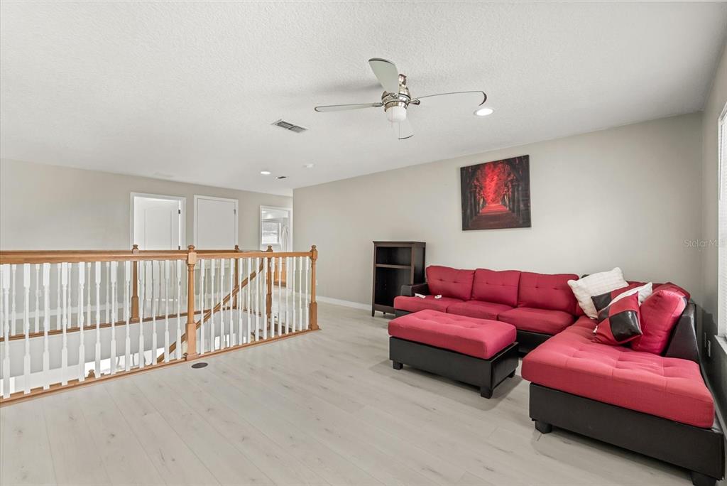 871 Blairmont Lane Lake Mary, FL 32746 - Photo 47 of 56 a living room with furniture