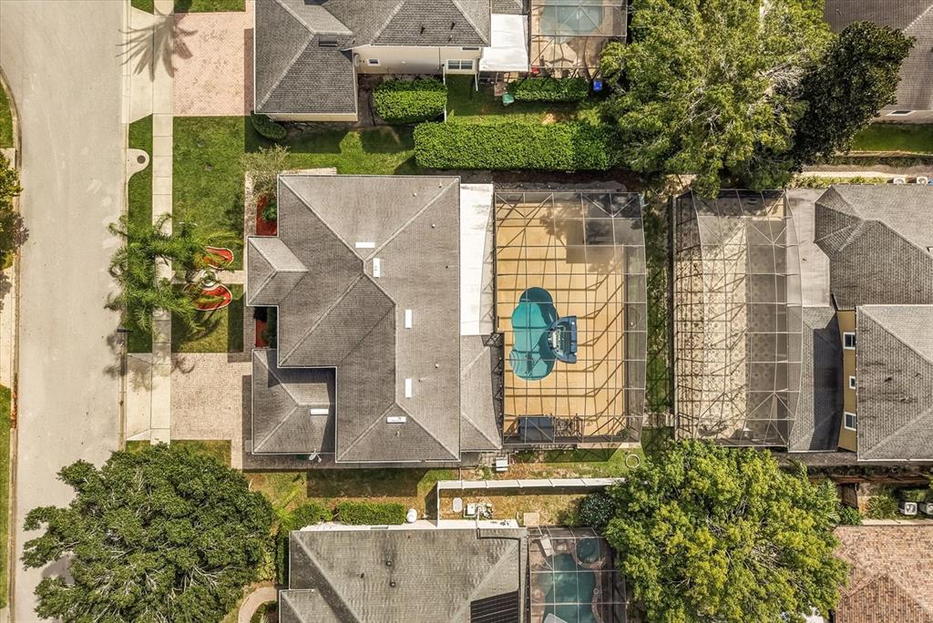 871 Blairmont Lane Lake Mary, FL 32746 - Photo 54 of 56 an aerial view of a house with garden space and street view