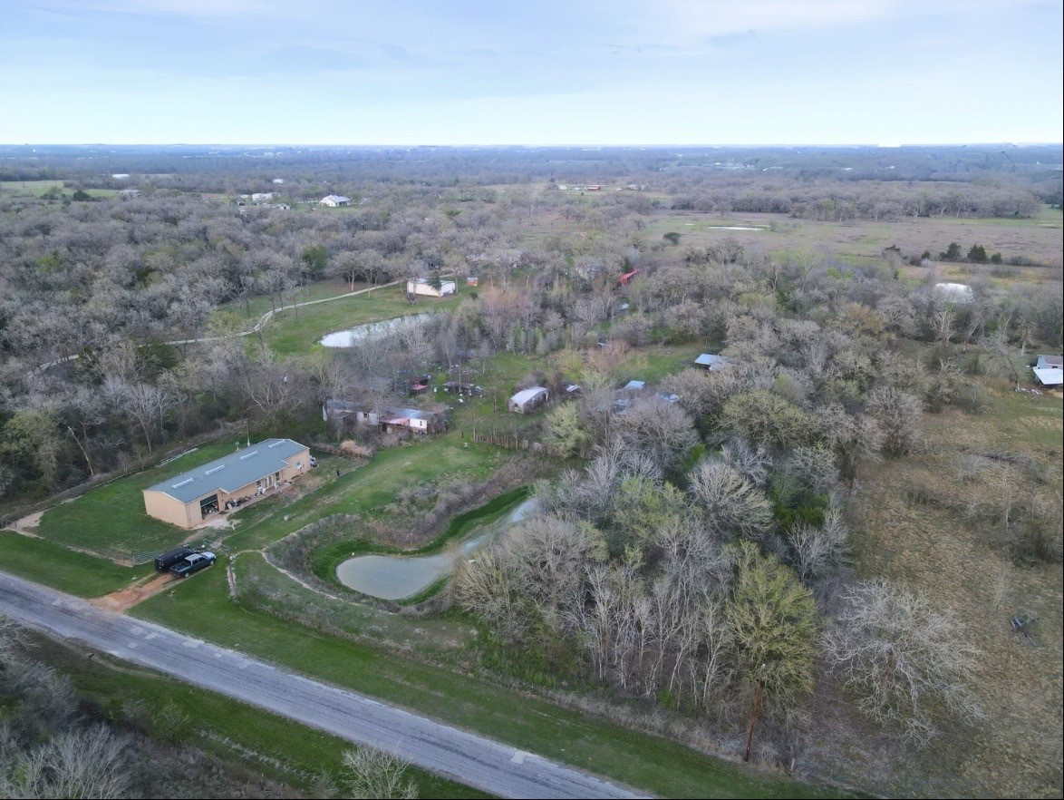Tbd Kmiec Road Hempstead, TX 77445 - Photo 3 of 3 an aerial view of a house with a yard
