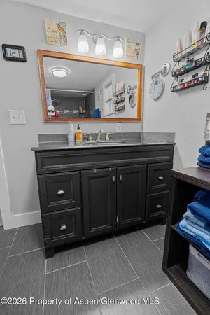 a view of a dresser with mirror