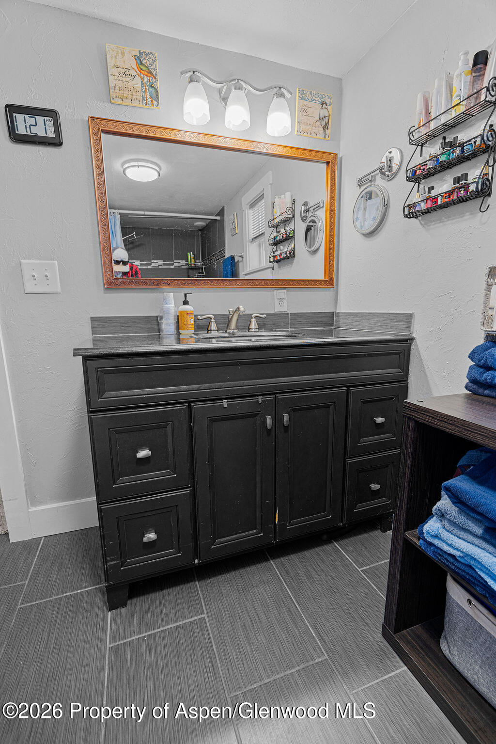 1464 Sage Street Craig, CO 81625 - Photo 20 of 47 a view of a dresser with mirror