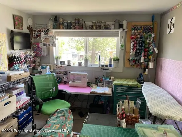 a room with furniture and a window