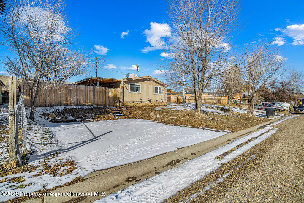 1464 Sage Street Craig, CO 81625 - Photo 39 of 47 a view of a backyard of the house