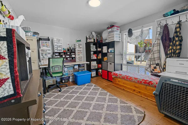 a living room with lots of furniture and window