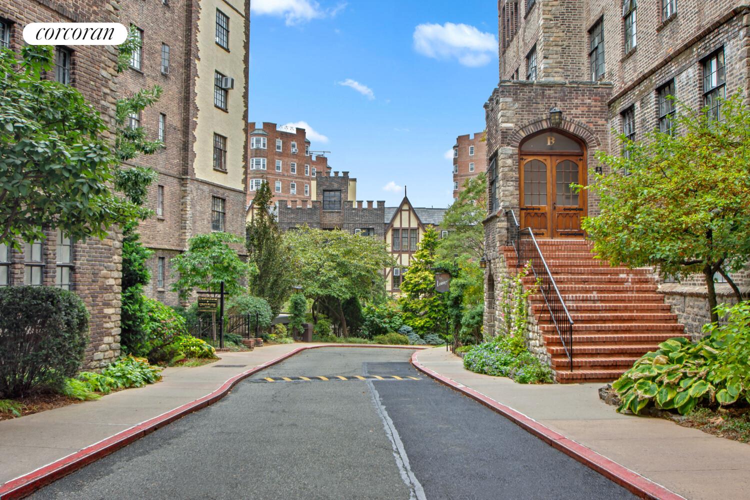 116 Pinehurst Avenue, Unit D1 Manhattan, NY 10033 - Photo 10 of 17 a front view of a multi story building with yard