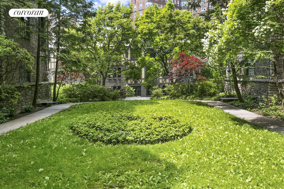 116 Pinehurst Avenue, Unit D1 Manhattan, NY 10033 - Photo 9 of 17 a view of a street with a building in the background