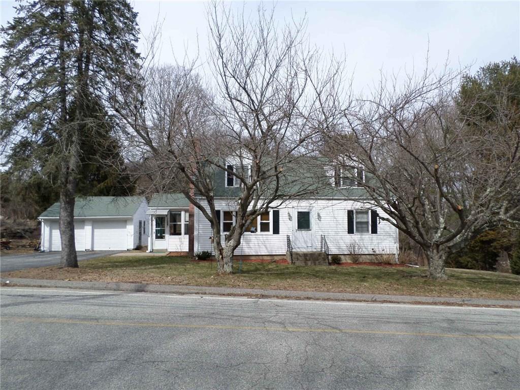 39 Sharp Hill Road Montville, CT 06382 - Photo 1 of 1 a white house that has a tree on the side of it