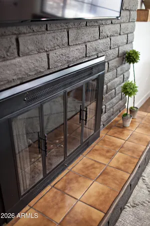 a room with furniture and flat screen tv