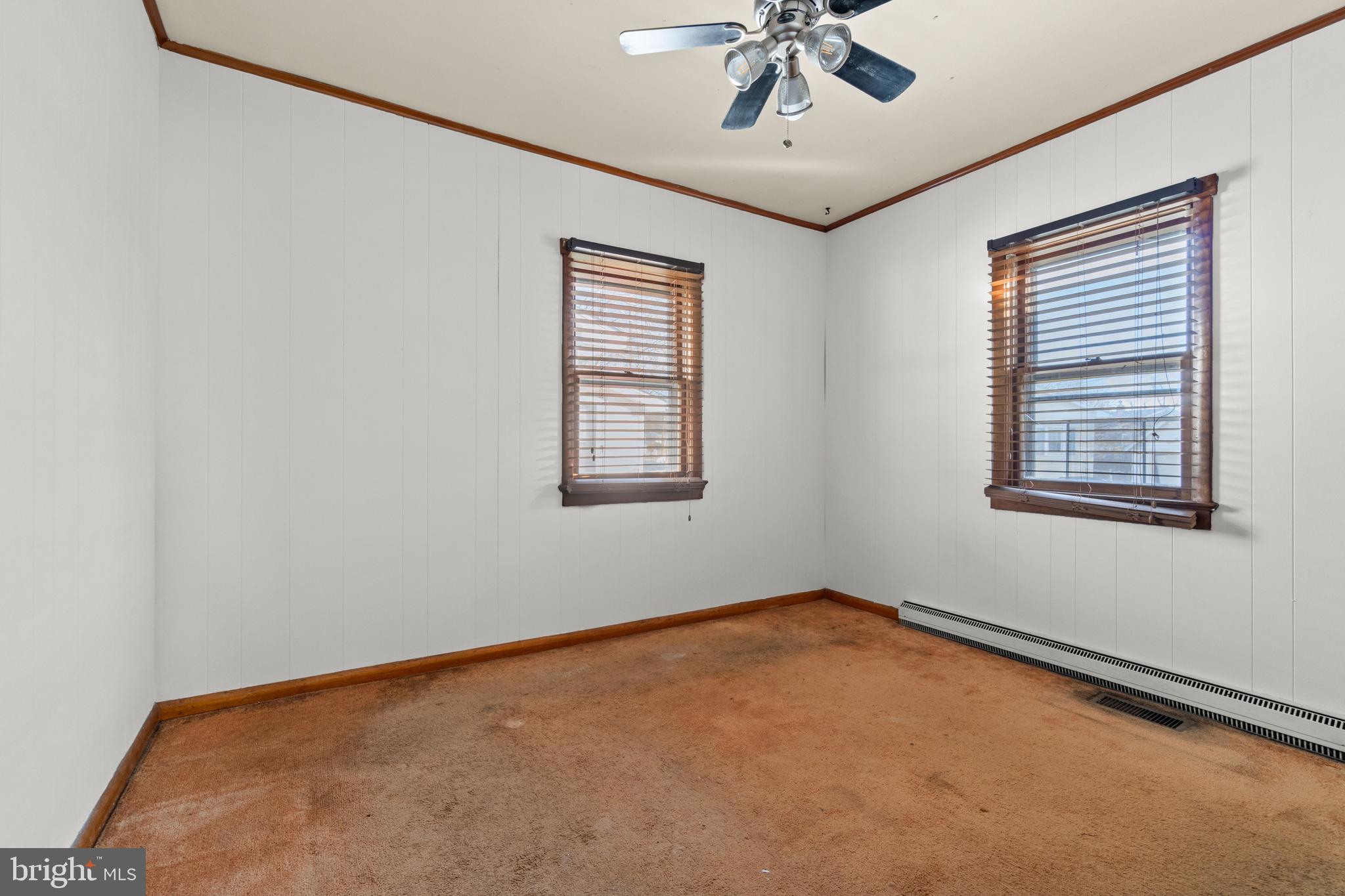 262 Laurel Street Carneys Point, NJ 08069 - Photo 8 of 12 a view of an empty room with a window