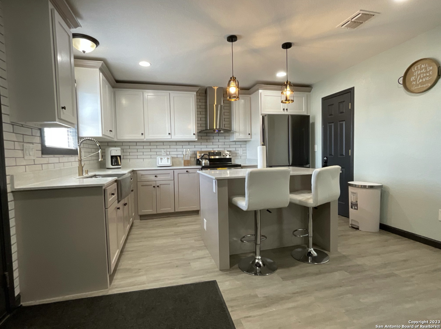 6650 Hartnet Fields Converse, TX 78109 - Photo 19 of 29 a kitchen with a sink cabinets and window