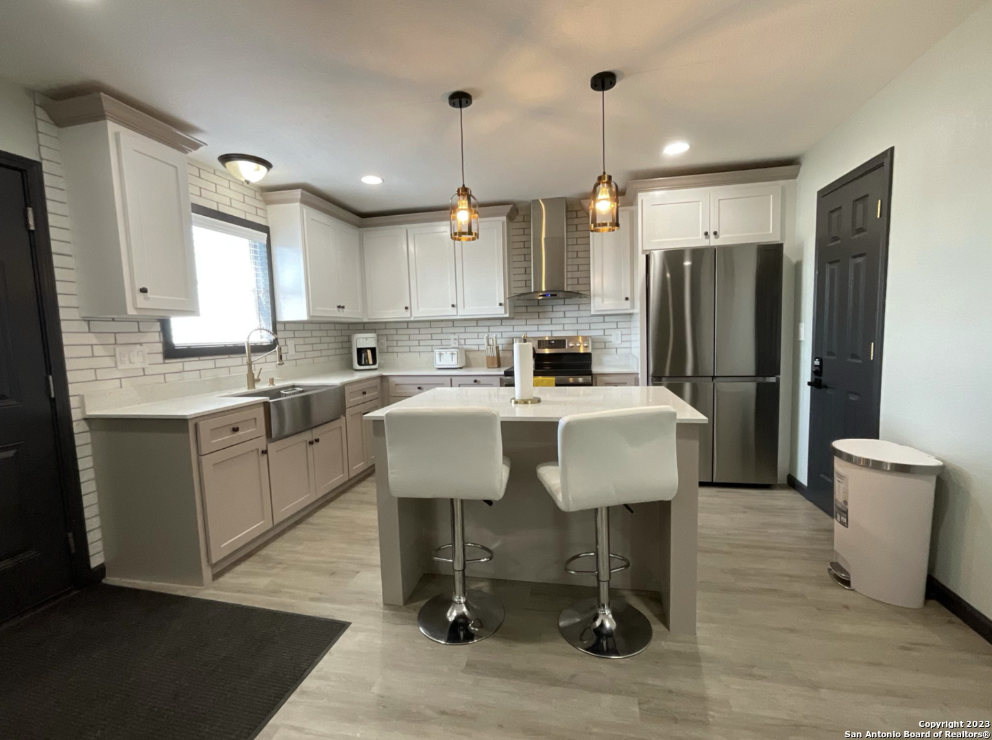 6650 Hartnet Fields Converse, TX 78109 - Photo 20 of 29 a kitchen with a sink appliances and cabinets