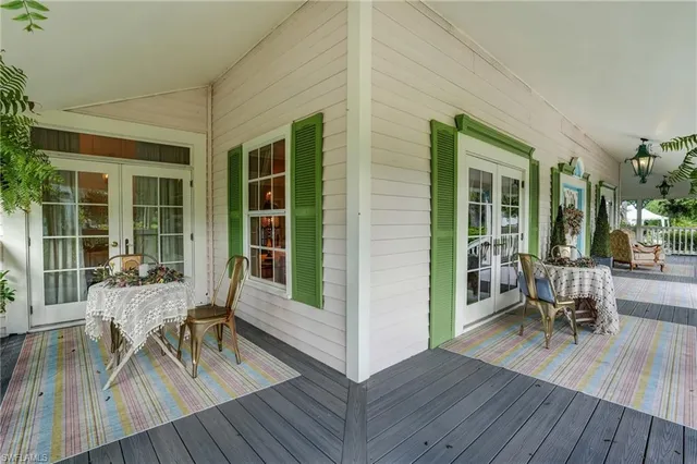 a kitchen with a table and chairs in it