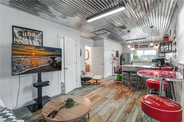 a kitchen with stainless steel appliances granite countertop a sink dishwasher stove and cabinets