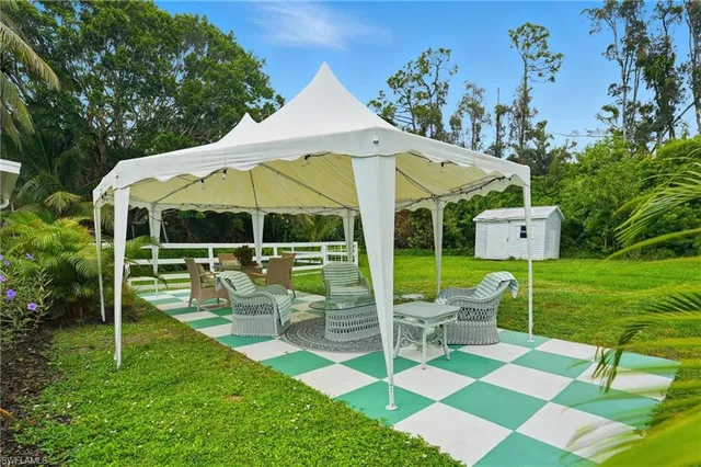 an aerial view of a house with a garden