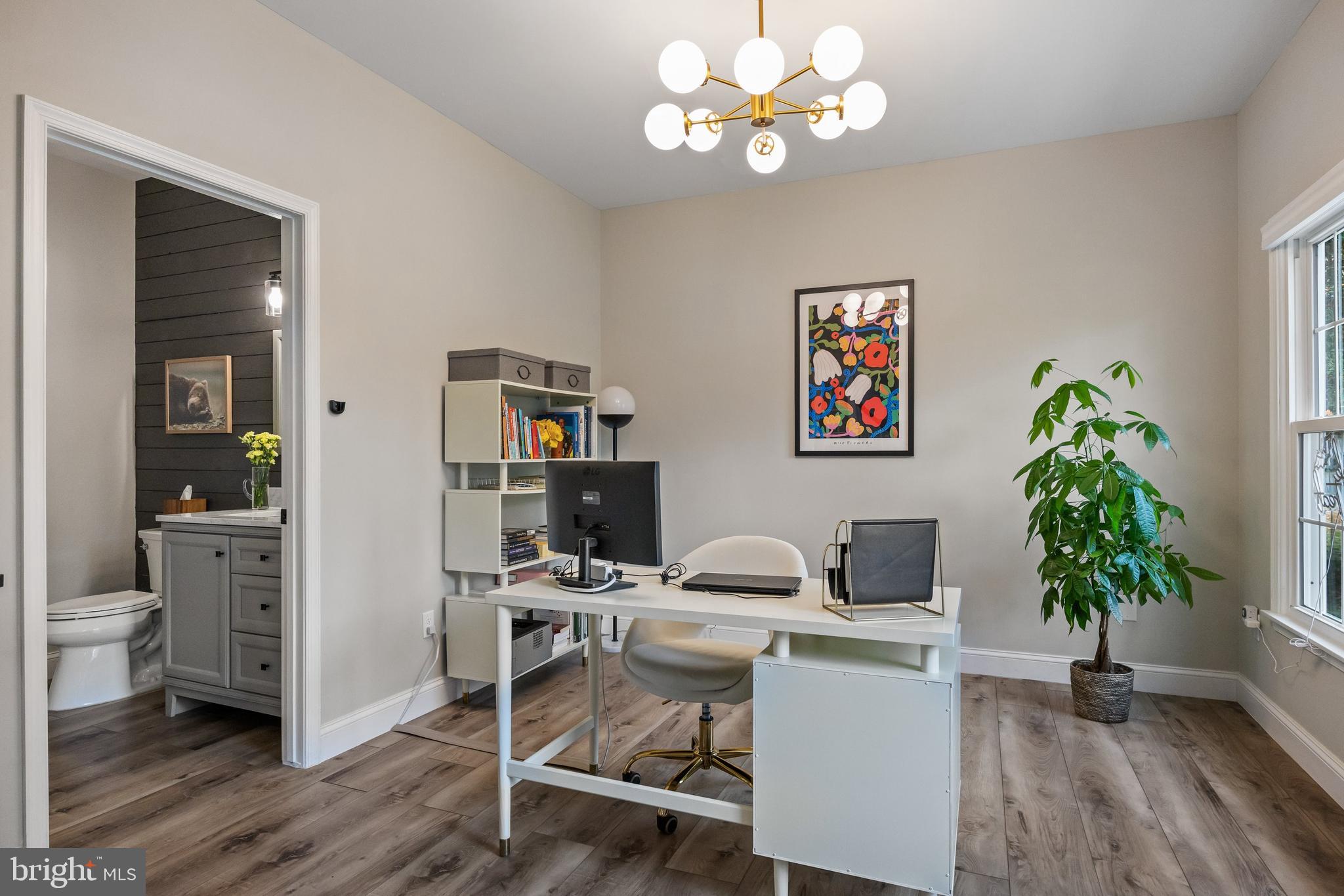 316 West 3rd Street Moorestown, NJ 08057 - Photo 19 of 48 a view of a workspace with furniture and a potted plant