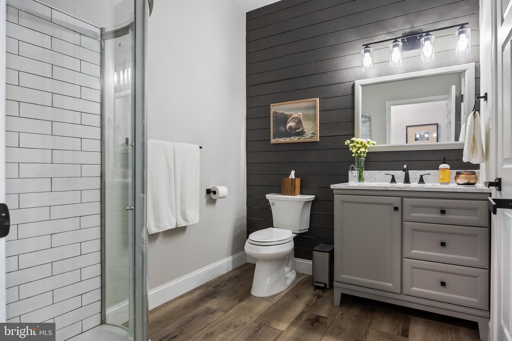 316 West 3rd Street Moorestown, NJ 08057 - Photo 20 of 48 a bathroom with a toilet sink and mirror