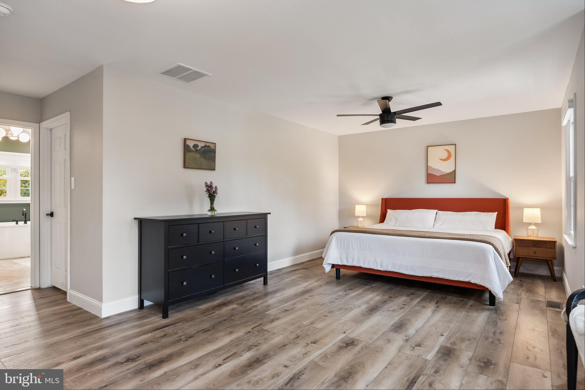 316 West 3rd Street Moorestown, NJ 08057 - Photo 26 of 48 a spacious bedroom with a bed and a dresser