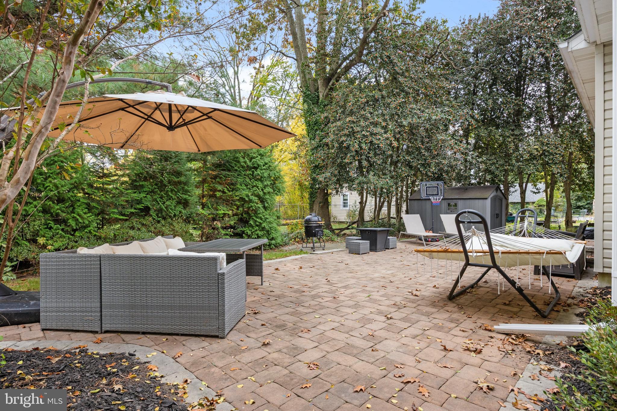 316 West 3rd Street Moorestown, NJ 08057 - Photo 37 of 48 a backyard of a house with table and chairs