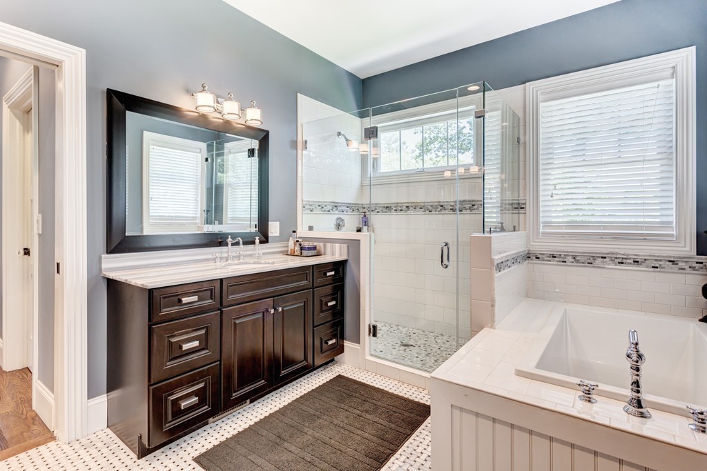 164 Beach Street Sharon, MA 02067 - Photo 18 of 30 a bathroom with a sink double vanity and a bathtub