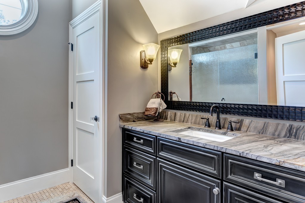 164 Beach Street Sharon, MA 02067 - Photo 21 of 30 a bathroom with a granite countertop sink and a mirror