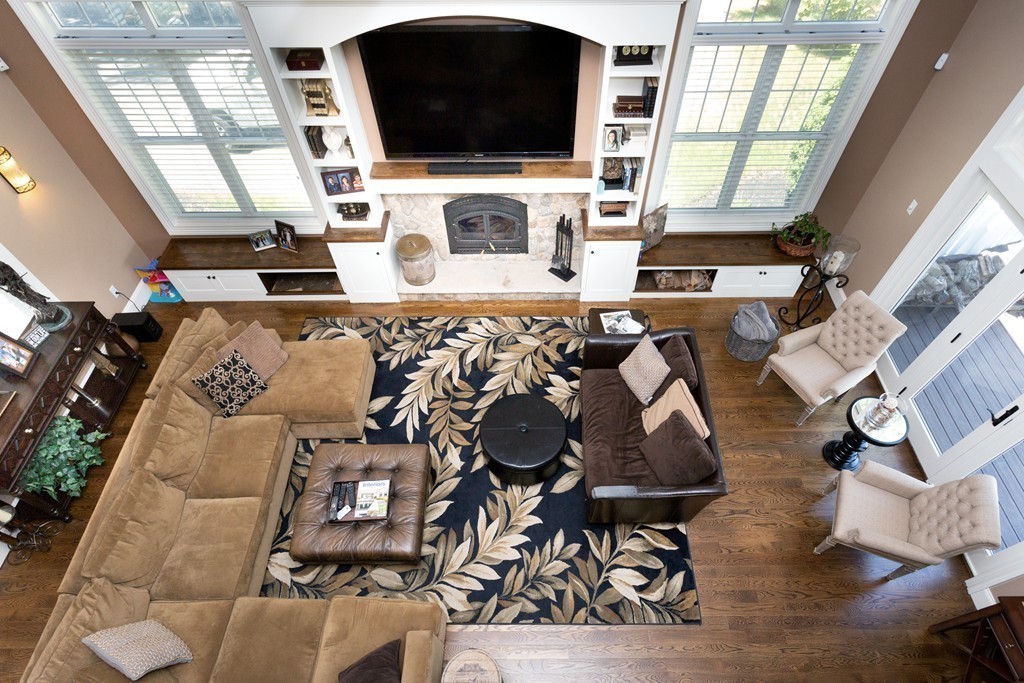 164 Beach Street Sharon, MA 02067 - Photo 26 of 30 a living room with furniture and a flat screen tv