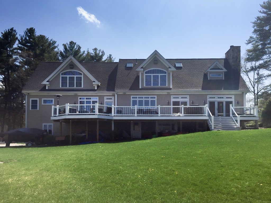 164 Beach Street Sharon, MA 02067 - Photo 27 of 30 a front view of a house with a yard
