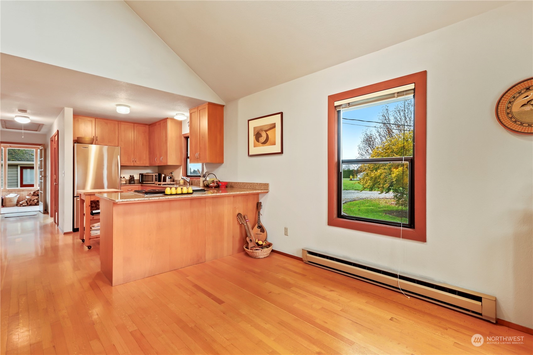 15916 Kamb Road Mount Vernon, WA 98273 - Photo 14 of 29 a living room with stainless steel appliances kitchen island granite countertop furniture and a window