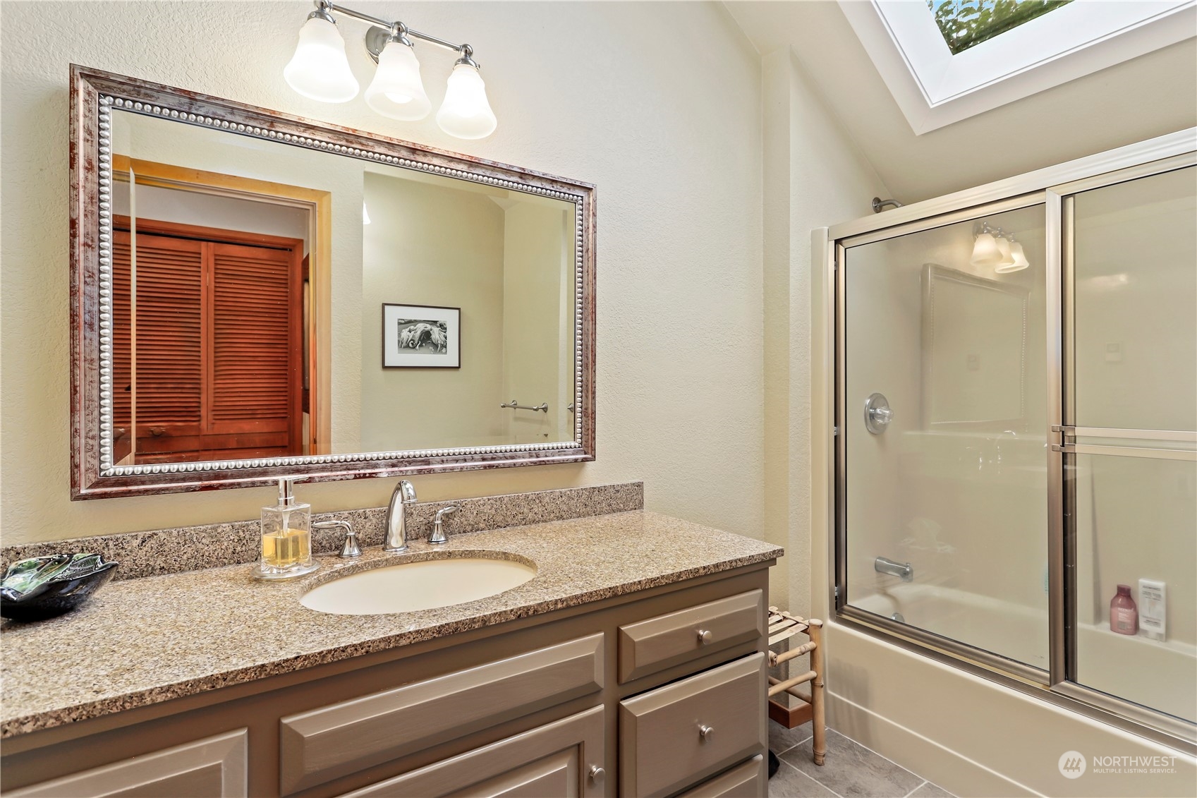 15916 Kamb Road Mount Vernon, WA 98273 - Photo 23 of 29 a bathroom with a granite countertop sink and a mirror