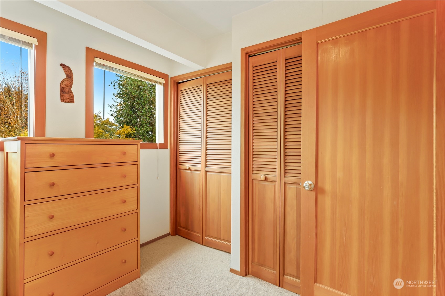15916 Kamb Road Mount Vernon, WA 98273 - Photo 25 of 29 a view of a dresser with wooden walls