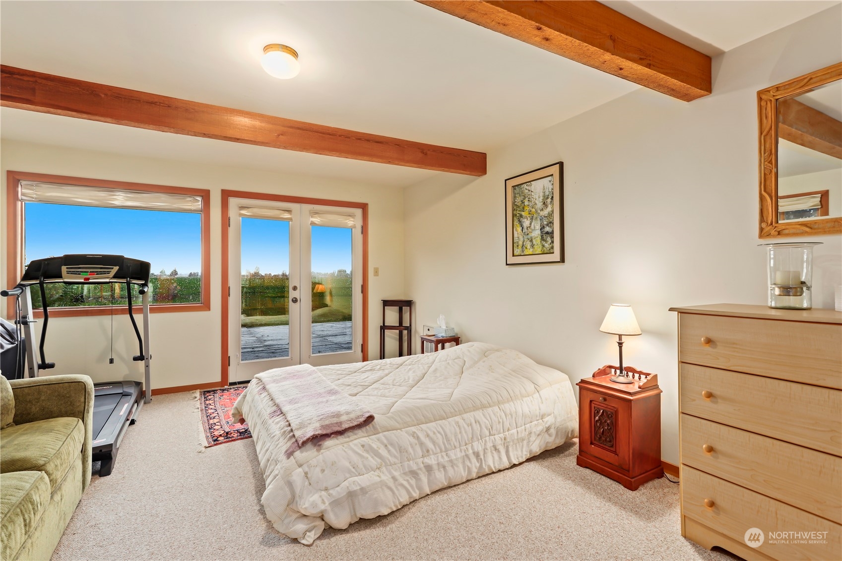 15916 Kamb Road Mount Vernon, WA 98273 - Photo 26 of 29 a bedroom with a bed and a mirror