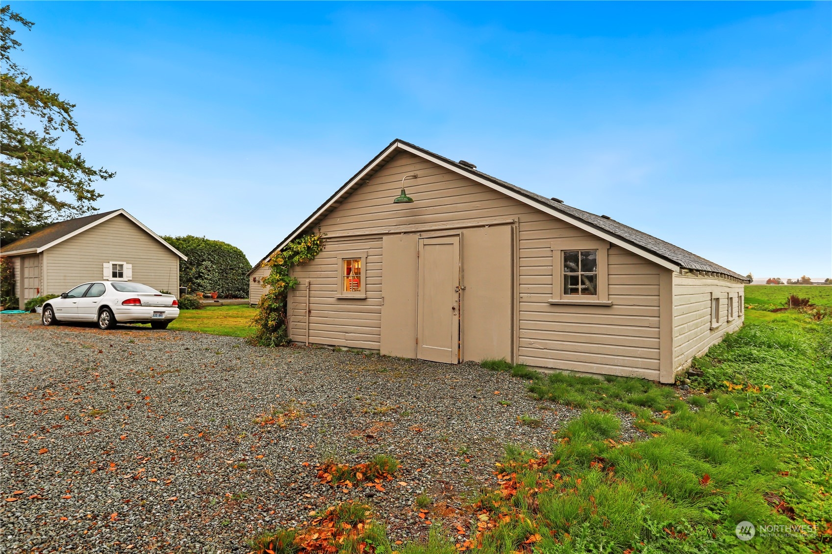 15916 Kamb Road Mount Vernon, WA 98273 - Photo 10 of 29 a view of a house with a yard and large trees