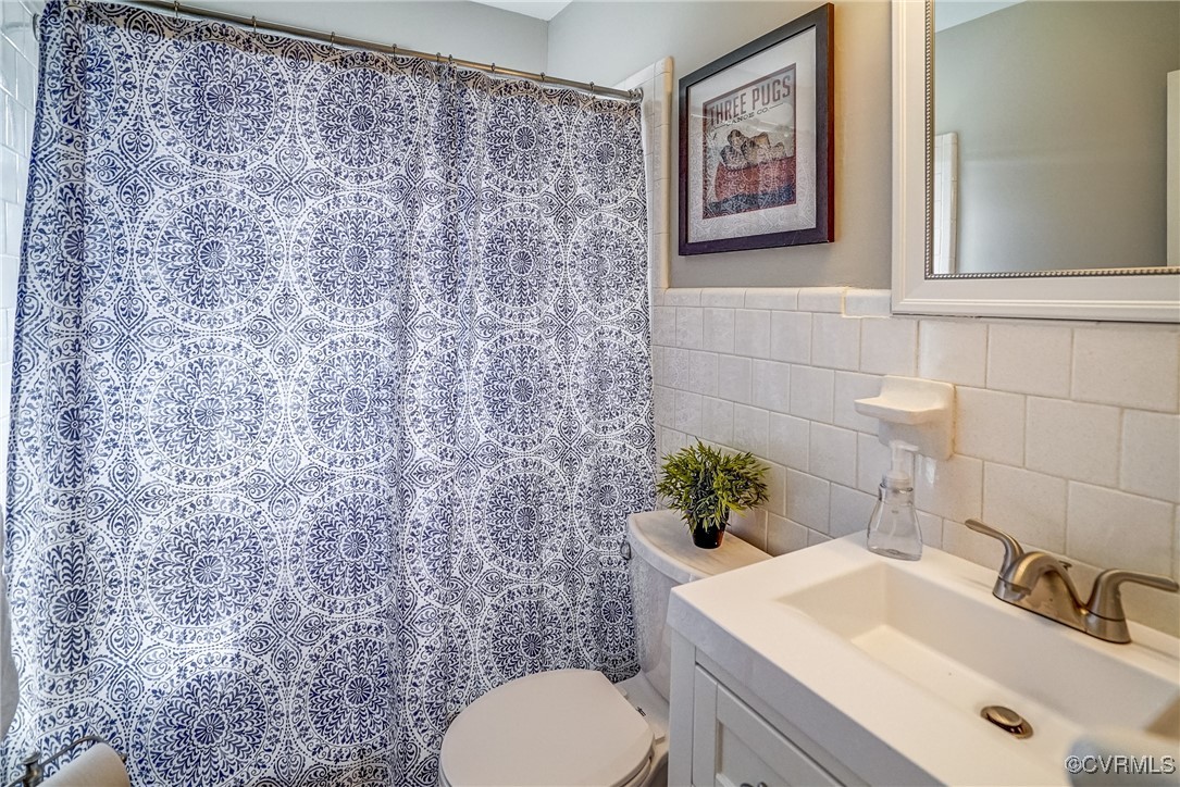 2703 Omega Road Henrico, VA 23228 - Photo 23 of 43 Bathroom with tile walls, and vanity-Updated!!