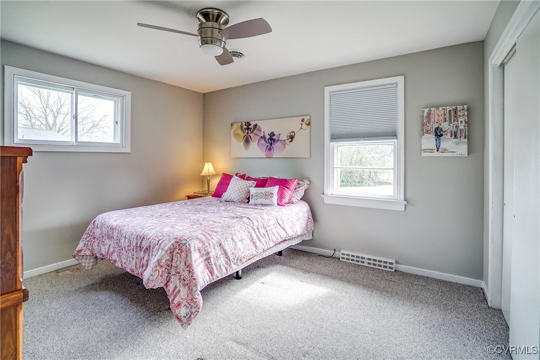 2703 Omega Road Henrico, VA 23228 - Photo 25 of 43 Bedroom with baseboards, visible vents, ceiling fa