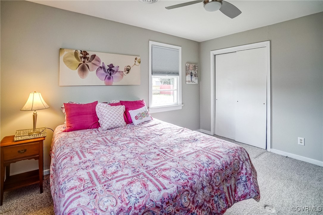 2703 Omega Road Henrico, VA 23228 - Photo 27 of 43 Carpeted bedroom featuring a ceiling fan, a closet